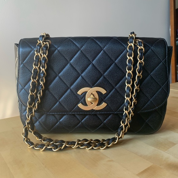 CHANEL Handbags - SOLDfirm price- Chanel Vintage Jumbo Caviar Flap